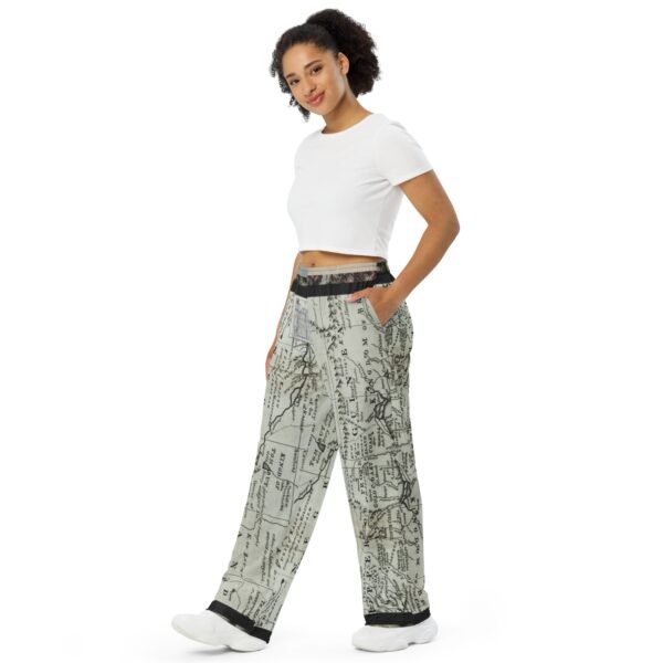 all-over-print-unisex-wide-leg-pants-white-left-front-69875707e597f.jpg Negroland - unisex wide-leg pants
